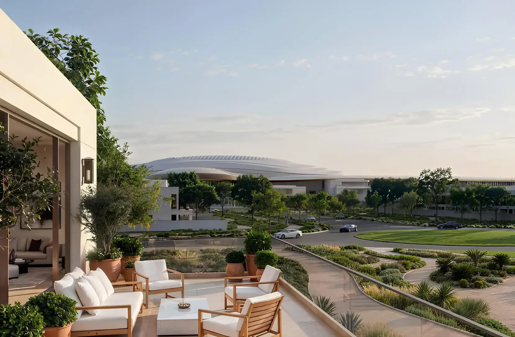 Evening view from a Wadeem Gardens terrace across the community towards the arena